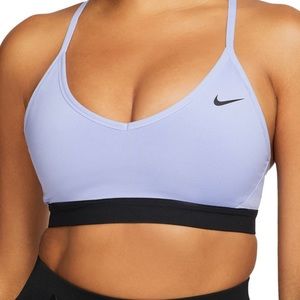 NIKE Indy sports bra in color light thistle size small